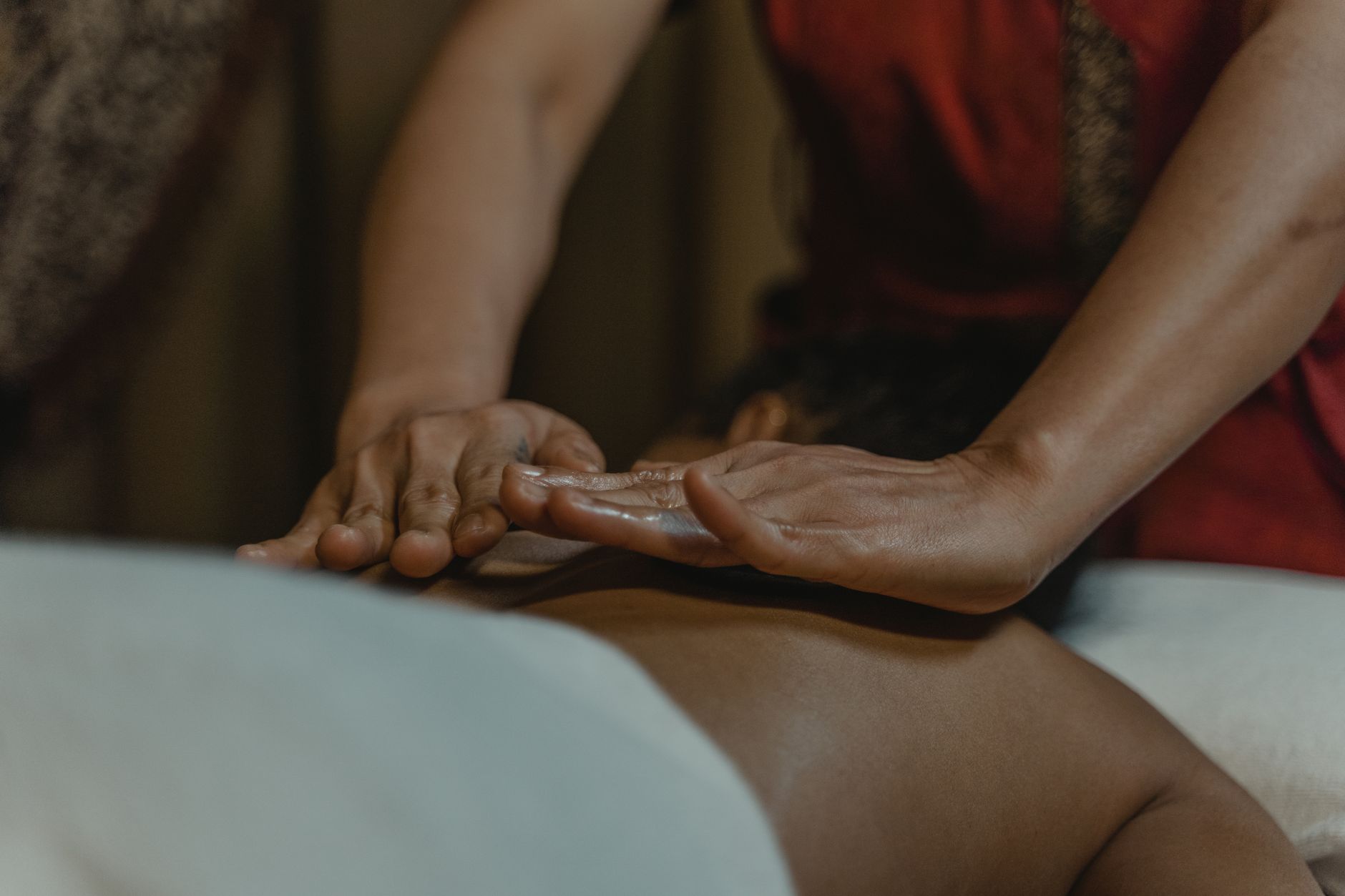 A therapist's hands during a relaxation massage
