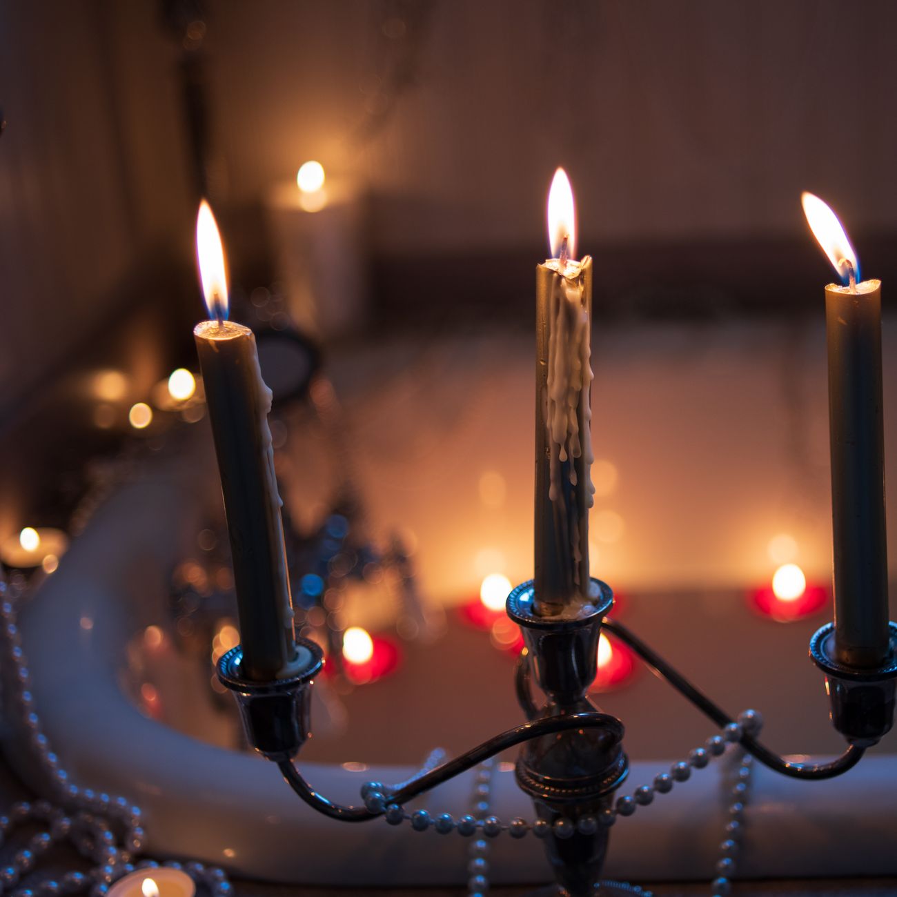 A candlelit soak drawn in a dark bath